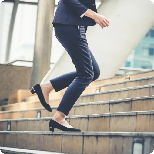 womanClimbingStairs